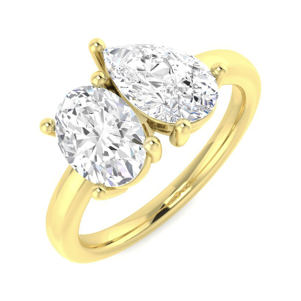 Oval & Pear Toi et Moi: Two claw-set stones on a plain shank