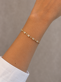 Emerald and Round Station Bracelet worn
