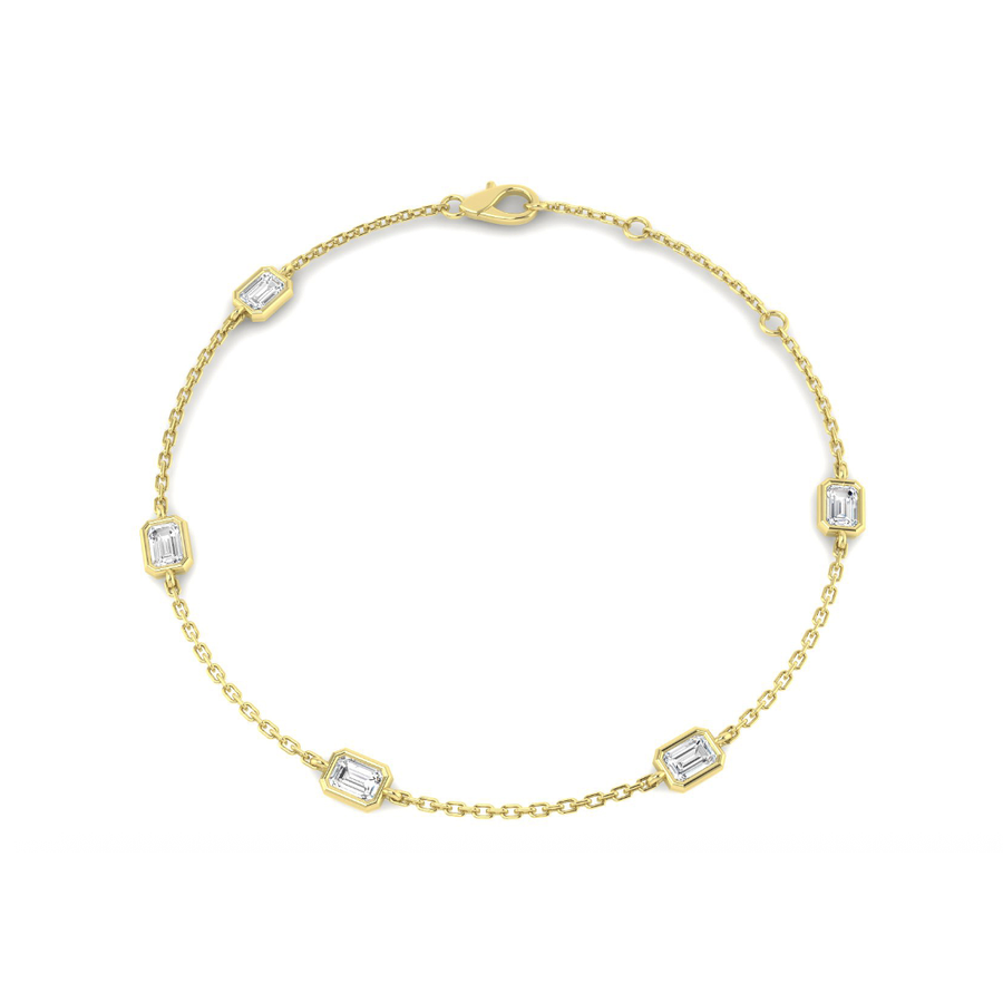 Five emerald-cut lab-grown diamonds in a 9K yellow gold station bracelet
