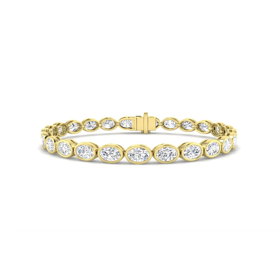 Oval bezel-set lab-grown diamond tennis bracelet in 9K yellow gold